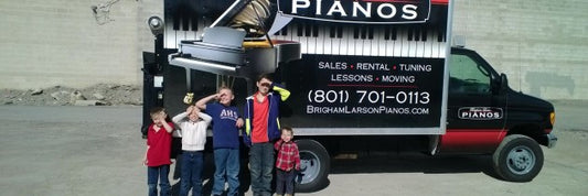 The Brigham & Karmel Larson Family Piano Blog - The Larson brothers, helping Dad move pianos - Casio