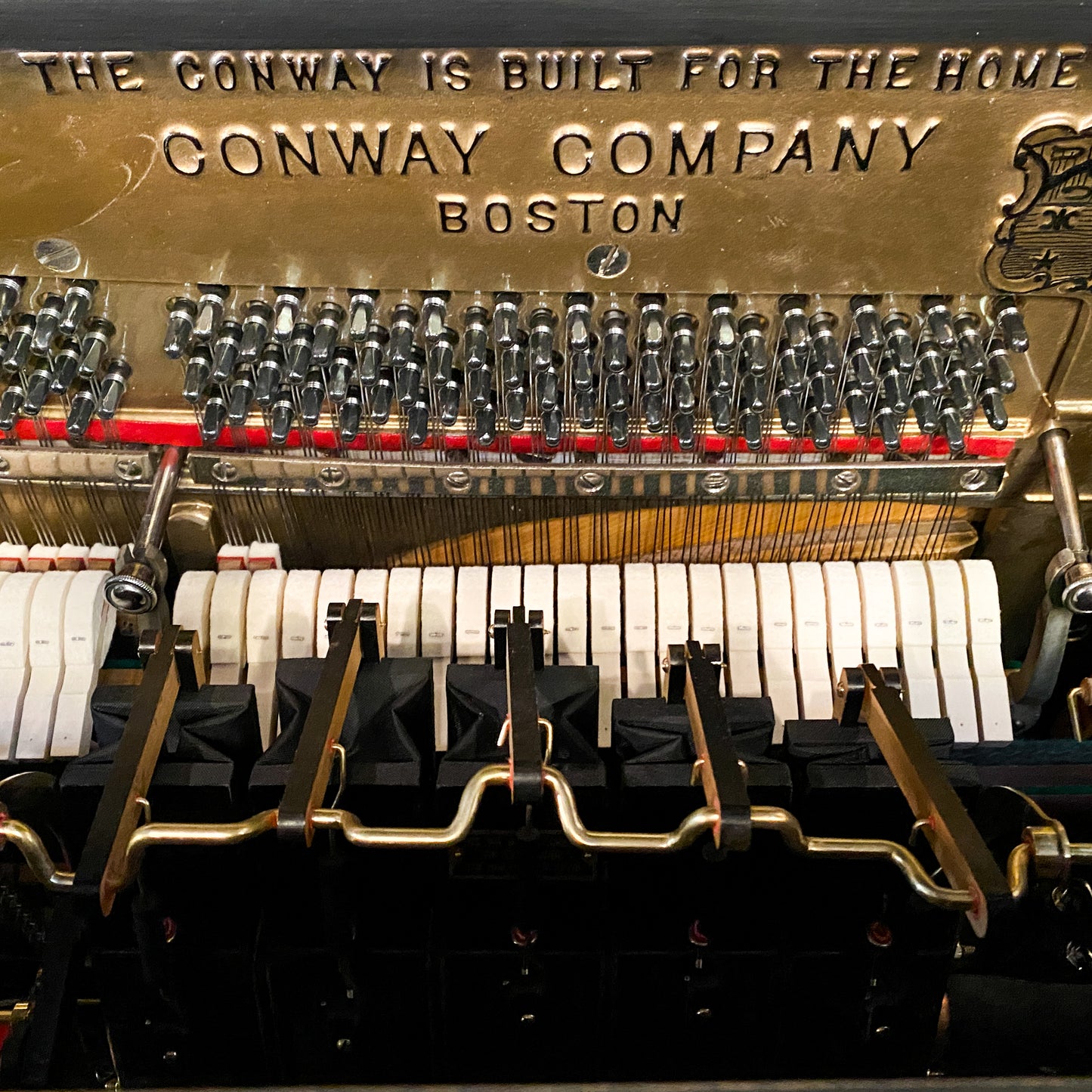 Beautifully restored heirloom hundred year old Conway restoration player piano rebuild at Brigham Larson Pianos family heirloom piano restoration shop.