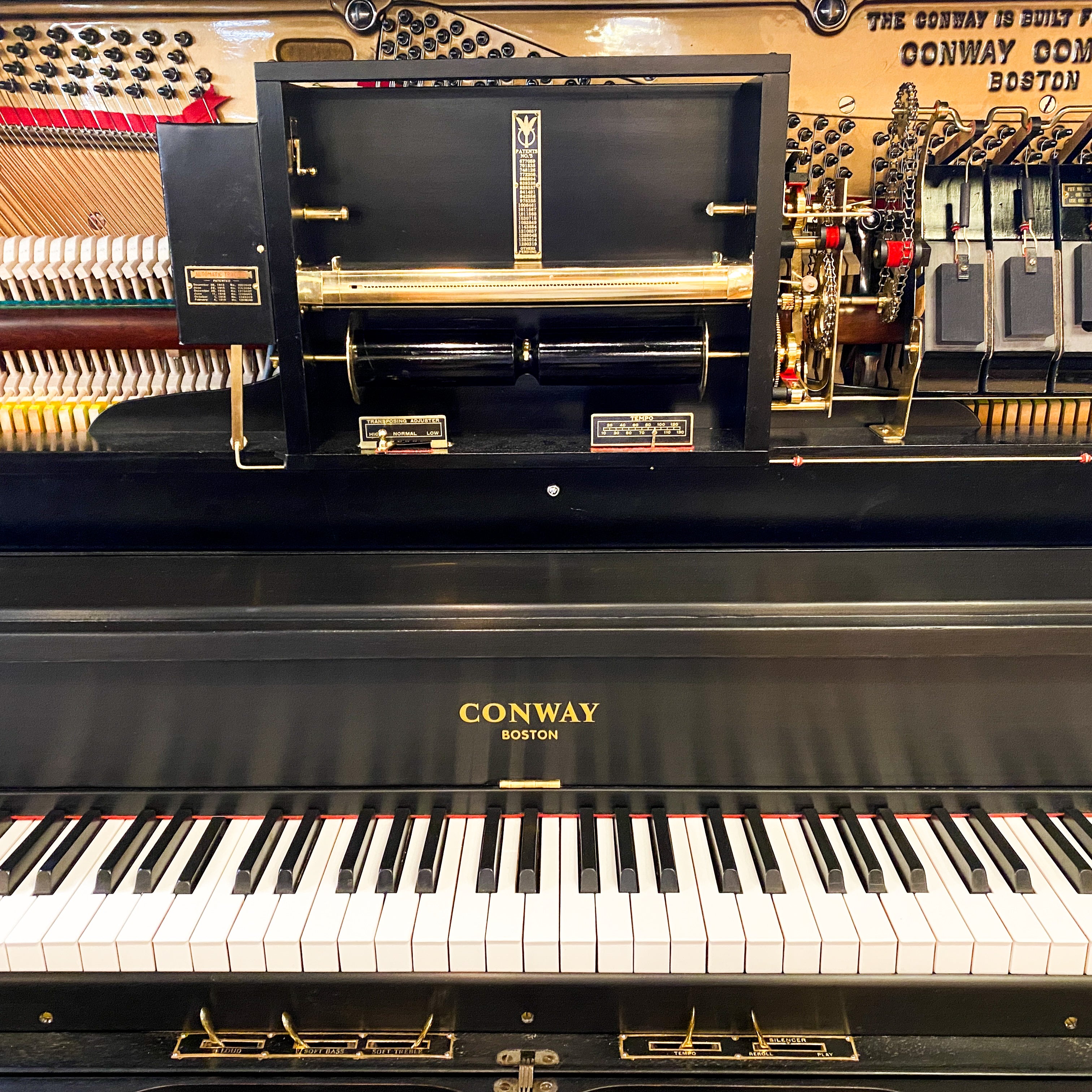 Beautifully restored heirloom hundred year old Conway restoration vintage pnumatic player piano rebuild at Brigham Larson Pianos family heirloom piano restoration shop.