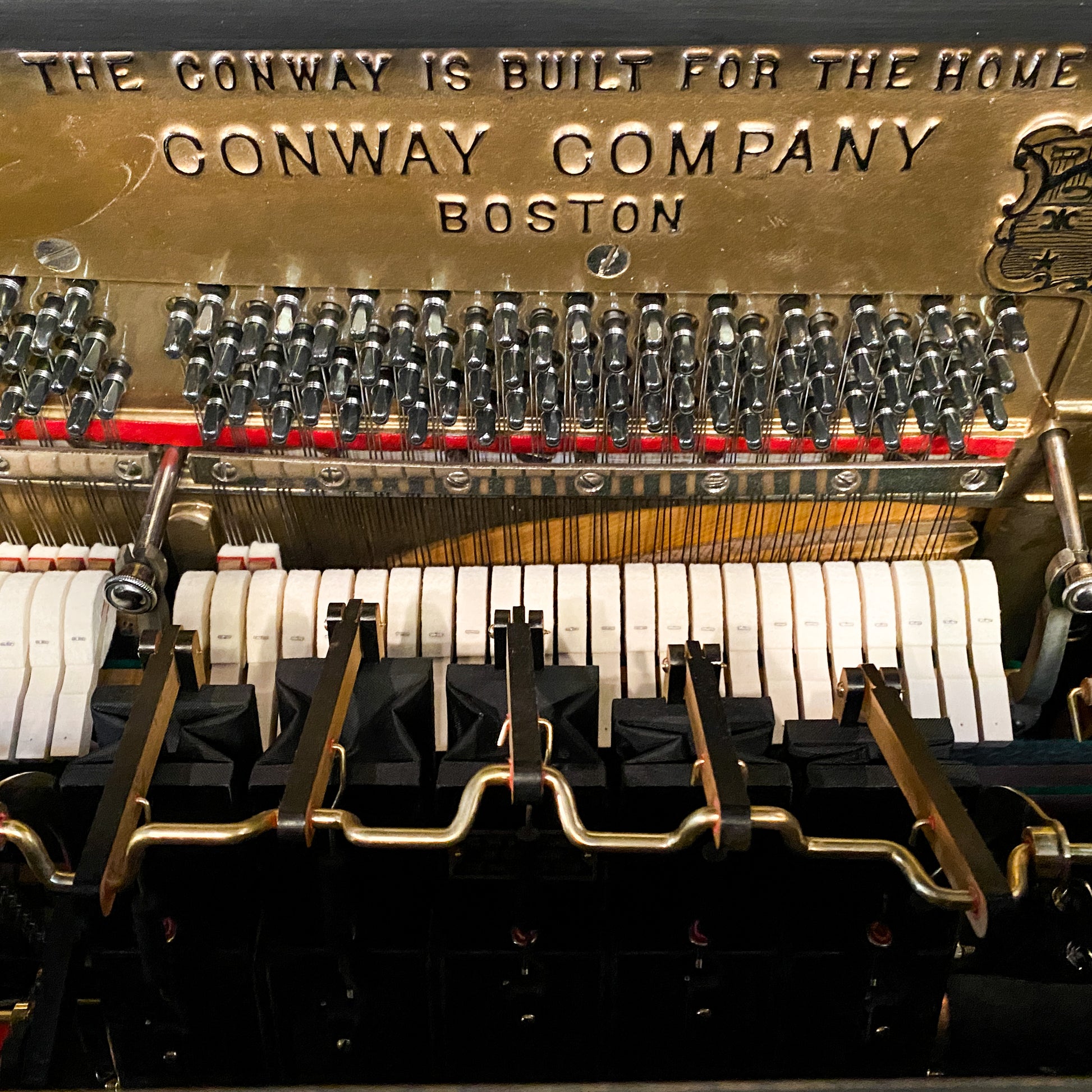 Beautifully restored heirloom hundred year old Conway restoration player piano rebuild at Brigham Larson Pianos family heirloom piano restoration shop.