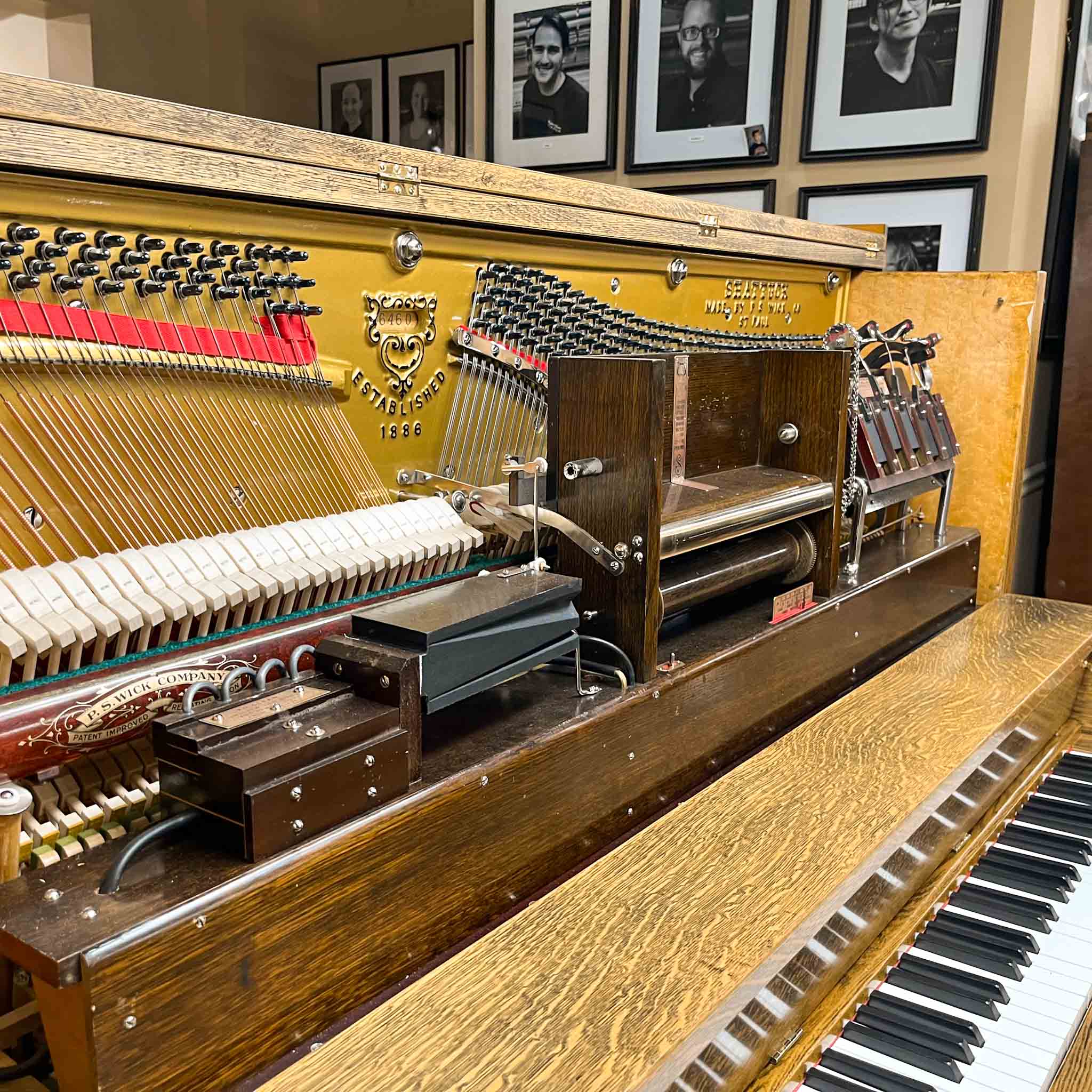 Beautiful upright heirloom hundred year old piano Shattuck vintage pnumatic player piano after restoration at Brigham Larson Pianos Family heirloom restoration shop in Orem, Utah.