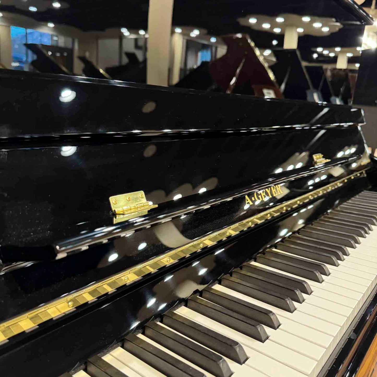 SOLD A. Geyer GU-123 48" Polished Black Upright Piano
