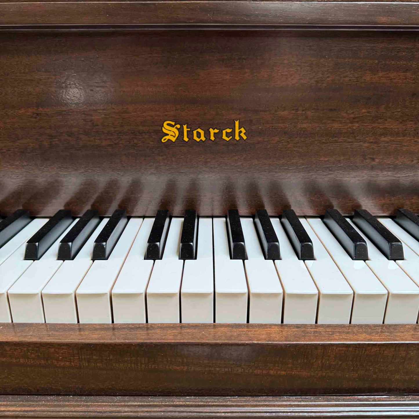 1920 Starck 4'11" Wood Finish Baby Grand Piano