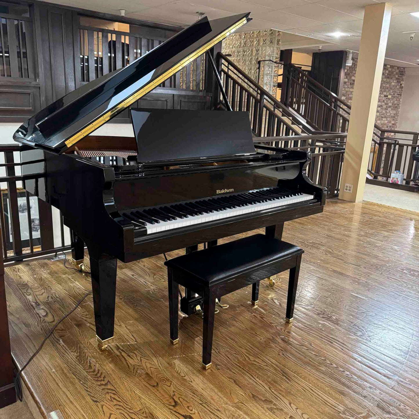 Hamilton (by Baldwin) 4'11" Polished Black Baby Grand Piano