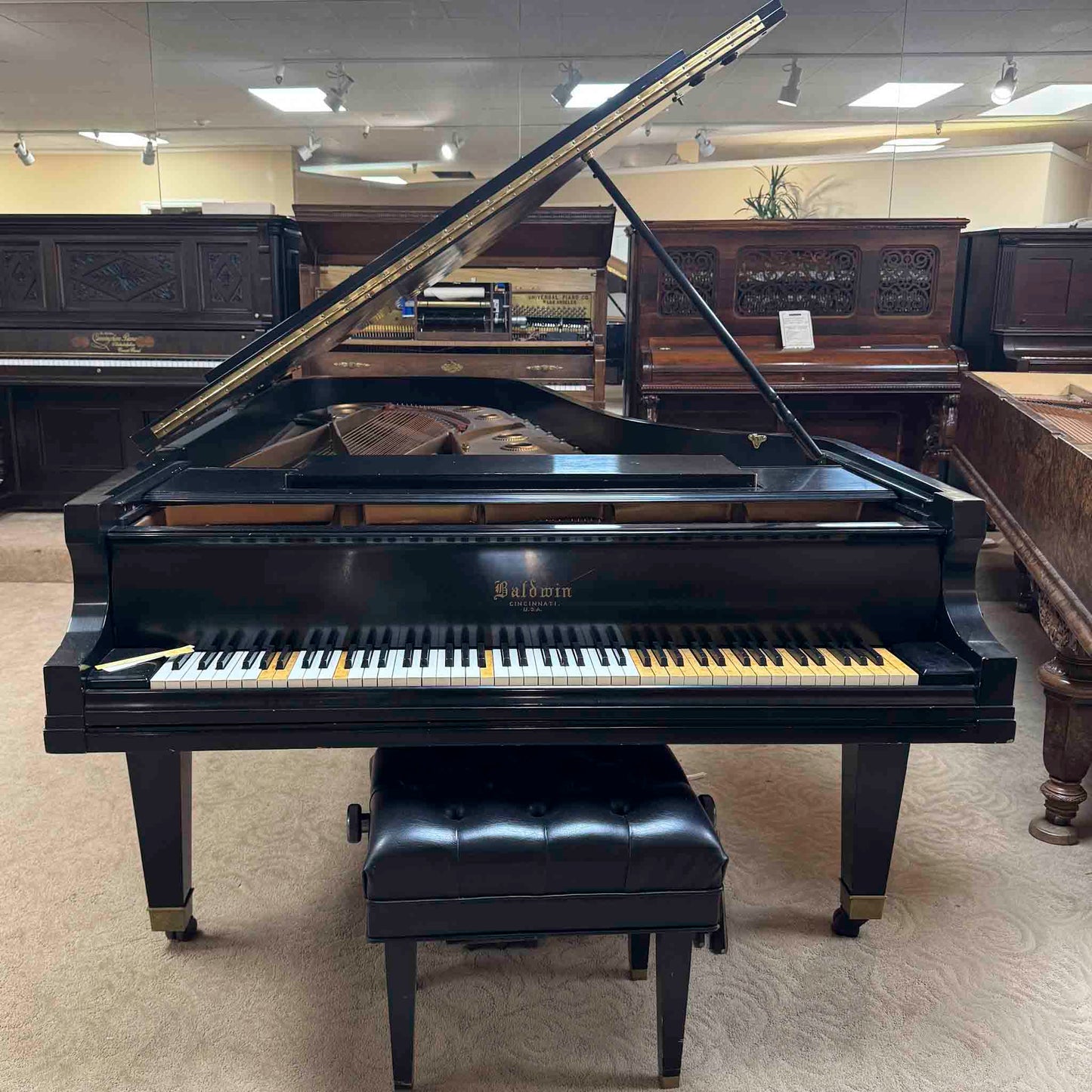 AVAILABLE TO RESTORE: CALL FOR CUSTOM PRICING—1925 Baldwin Grand 9' Satin Black Grand Piano