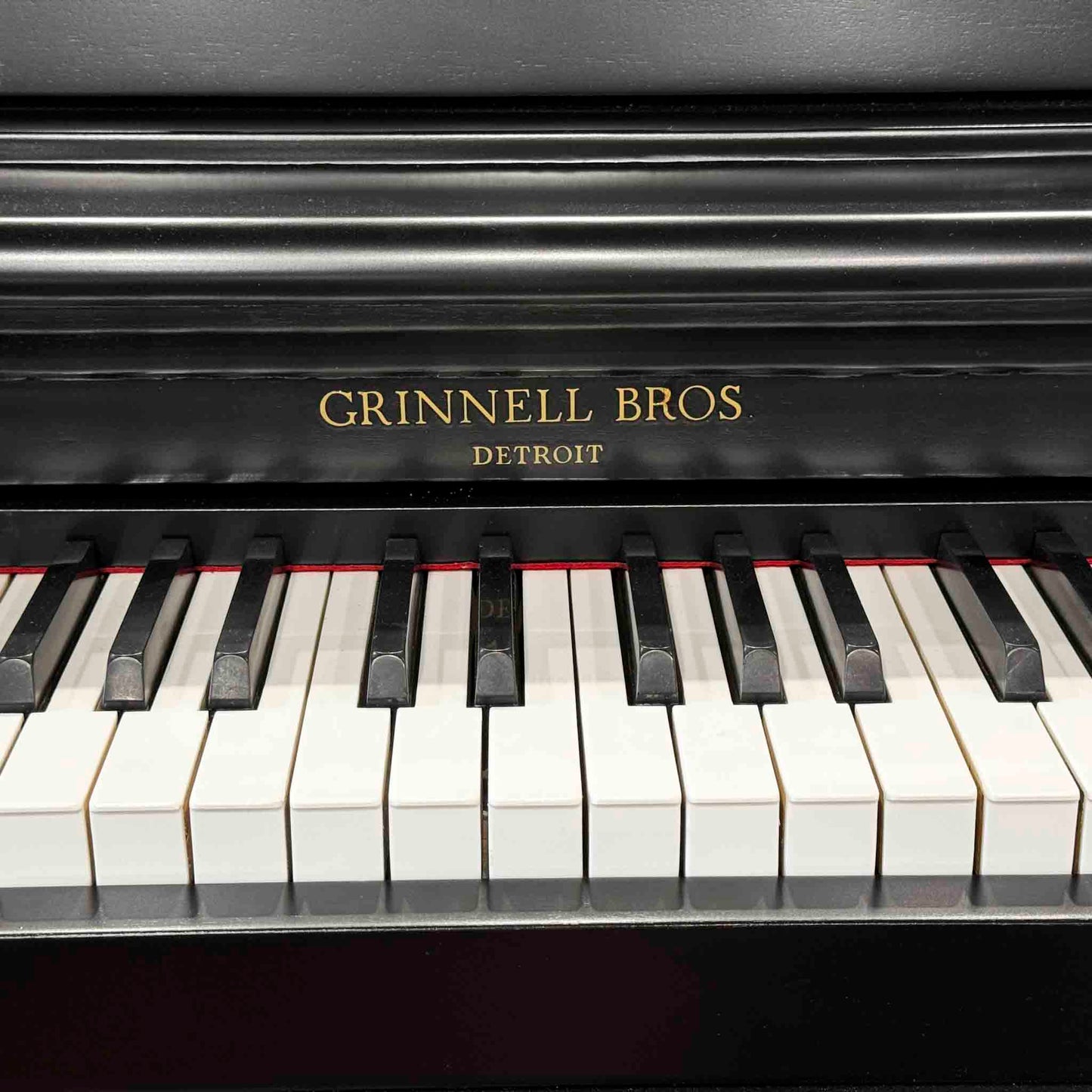 1956 Grinnell Bros 39" Satin Black Spinet Piano
